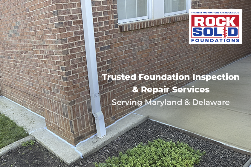 Rock Solid Foundations technician inspecting a cracked foundation