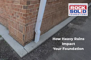 Rainwater pooling around a home’s foundation